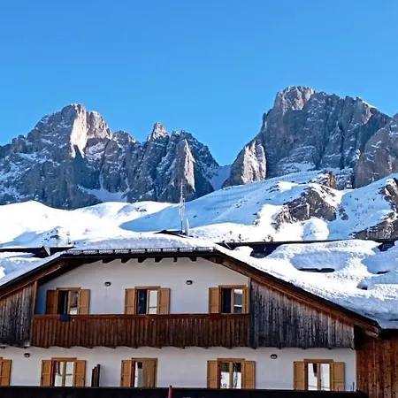 Apartment La Pulce Innevata - Agenzia Dolomiti Affitti Passo Rolle